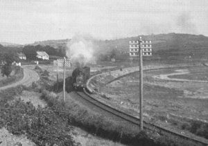 The 'Golfers Express' on the curve between Dundrum and Newcastle pre-1950. headed by 4-4-2T loco No. 18